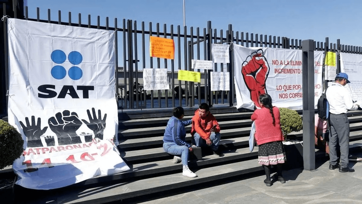 Paro en SAT se extiende por demandas salariales y amenazas